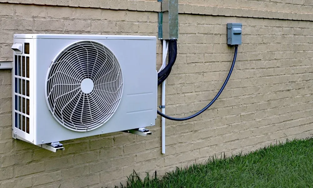 110 vs 220 mini split — ductless outdoor condenser unit wired during a DIY installation