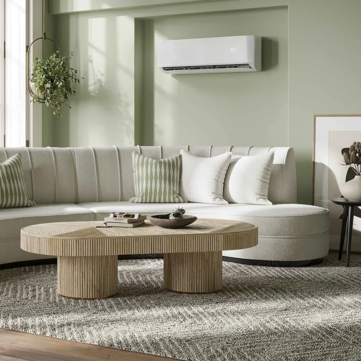 Wall-mounted ductless mini split air conditioner in a bright living room